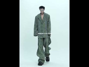 360-degree video showcasing the textured denim jacket with metal zipper and all deconstructed design details