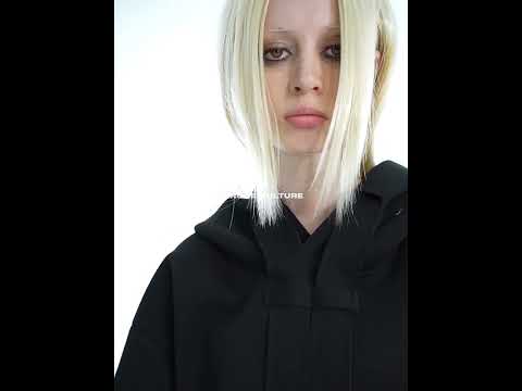 Video demonstrating how to wear and style this oversized deconstructed hoodie with detachable sash streetwear set