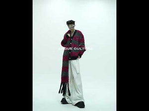 360-degree video showing the chunky knit Christmas sweater with oversized scarf design from all angles