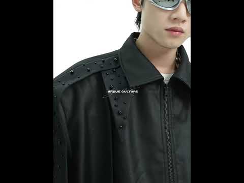 Video showing vintage wax-dye bomber jacket in motion, highlighting split design and premium fabric drape