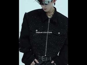 360-degree video showcasing the cropped fit, shoulder pads and rhinestone design of this avant-garde denim jacket