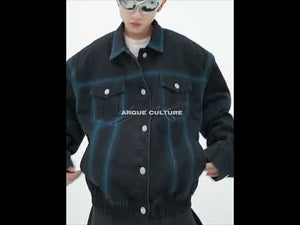 360-degree video showcase of the distressed vintage denim jacket highlighting its cropped fit and unique dye patterns