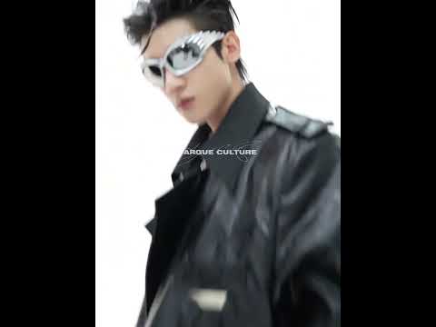 Video showcasing the unique double-layer patchwork design and oversized fit of this avant-garde long coat