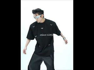 360-degree video showcasing the avant-garde deconstructed t-shirt with metal details and asymmetric cutouts