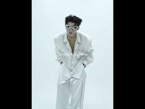 Video showcasing the fluid movement and elegant drape of premium ice silk loungewear set with padded shoulders