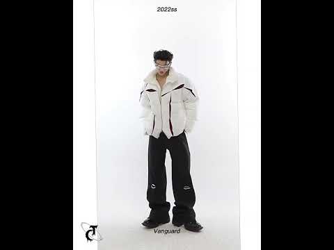 360-degree video showcase of unisex deconstructed puffer jacket with split-color design and stand collar