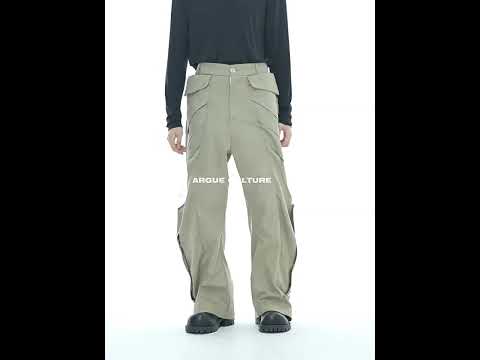 Video demonstrating the fit and movement of these loose fit cargo pants with metal snaps and pleats