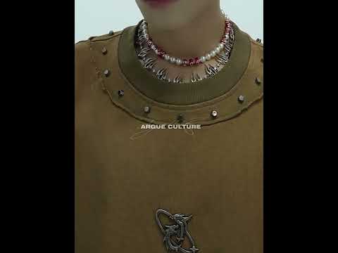 360-degree video showcasing the distressed oversized vintage t-shirt with metal studs being styled in different ways