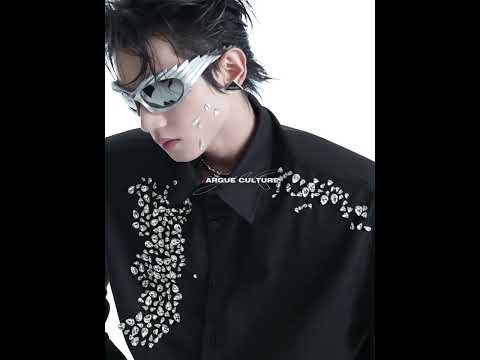 Video showcasing the crystal-embellished white shirt from all angles, highlighting the diamond trim and movement