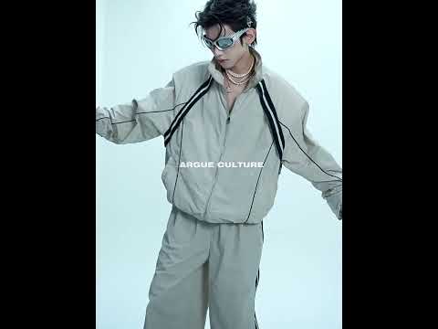 360-degree video showing trendy color-block sun hoodie and streetwear set with oversized fit and deconstructed design