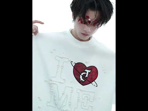 Video showing styling options for pearl-accented heart graphic oversized streetwear t-shirt