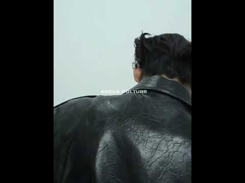 Video demonstration of the distressed waistcoat's detachable features and various ways to wear this statement piece