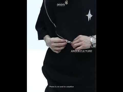 Video showcasing the avant-garde men's cotton tee from all angles, highlighting its unique cutting and design features