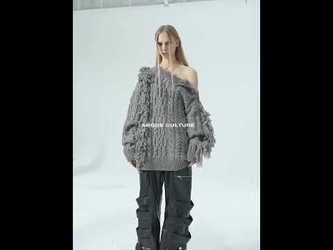 360-degree video showcasing how to style this cropped ribbed knit sweater with fringe details and metal buttons