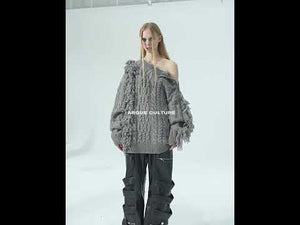 360-degree video showcasing how to style this cropped ribbed knit sweater with fringe details and metal buttons