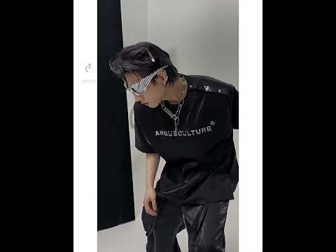 Video showcasing how to style the retro puff sleeve tee with metal buttons and liquid metal edge details