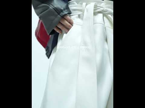 360-degree video showing deconstructed wide-leg pants with unique spliced design and comfortable fit