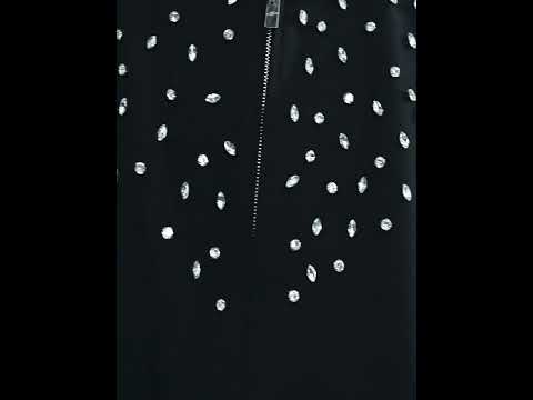 Video showing model wearing the slim fit short coat with full 360-degree view of the rhinestone detailing