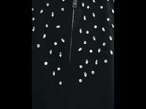 Video showing model wearing the slim fit short coat with full 360-degree view of the rhinestone detailing