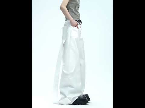 360-degree video showcasing all angles of these avant-garde loose fit pants with ribbon details