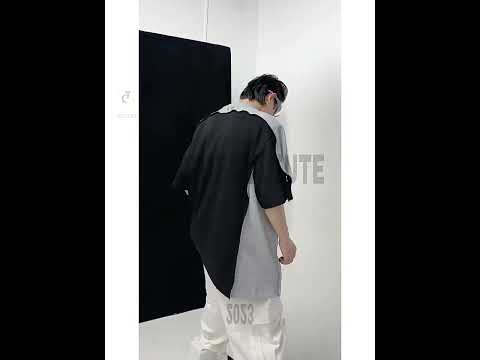 360-degree video showcasing the metallic wave sleeve design and patchwork details of this edgy streetwear tee