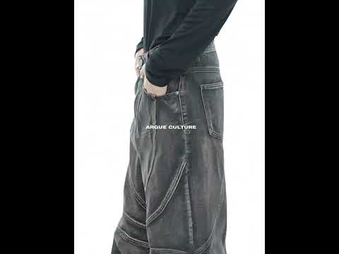 Video showing the relaxed flare fit and movement of these vintage distressed denim jeans