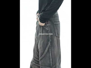 Video showing the relaxed flare fit and movement of these vintage distressed denim jeans