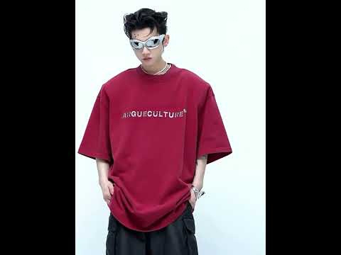 360-degree video showing all angles of this vintage washed cotton tee with metal logo and drop shoulder design