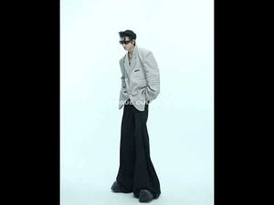 Video demonstrating how to wear this deconstructed blazer with liquid-shine fabric for urban fashion looks