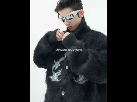 Video showing 360-degree view of oversized red knit cardigan with high neck and premium details
