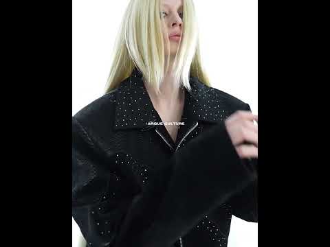 360-degree video showcasing the croc-embossed bomber jacket with metal studs and alligator splicing details