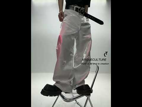 360-degree video showcasing the architectural silhouette and movement of genderless liquid-shine trousers
