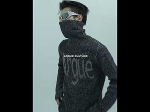 360-degree video showcasing the textured high-neck design and silver thread details of this premium knit sweater
