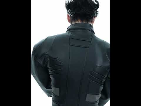 360-degree video showcase of deconstructed short leather coat being worn, highlighting contrast stitching and fit