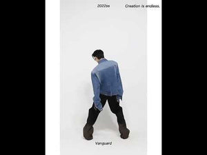 Video showing 360-degree view of vintage cropped denim jacket with metal buckle features and styling ideas