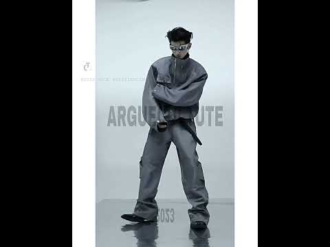 Video demonstrating the movement and features of futuristic utility windbreaker set with metal zipper details