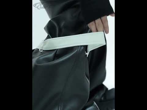 360-degree video showcasing all angles of these geometric cutout leather pants with belt detailing