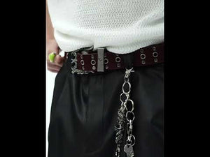 Video showing the movement and drape of the metallic wide-leg cargo pants in motion