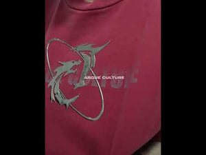 Video showing 360-degree view and fit demonstration of vintage washed graphic t-shirt with distressed details