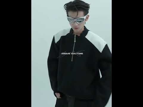 Video showcasing the deconstructed knit sweater with metal zipper and contrast design in motion