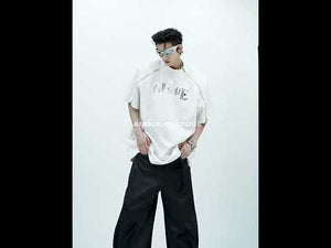 360-degree video showcasing all features of this edgy oversized streetwear t-shirt with metal trim details