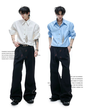 desc::red-lip-graphic-pleated-flare-trousers-detail-img-3