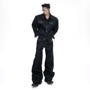 Front view of retro raw denim jacket with crocodile leather patchwork details.