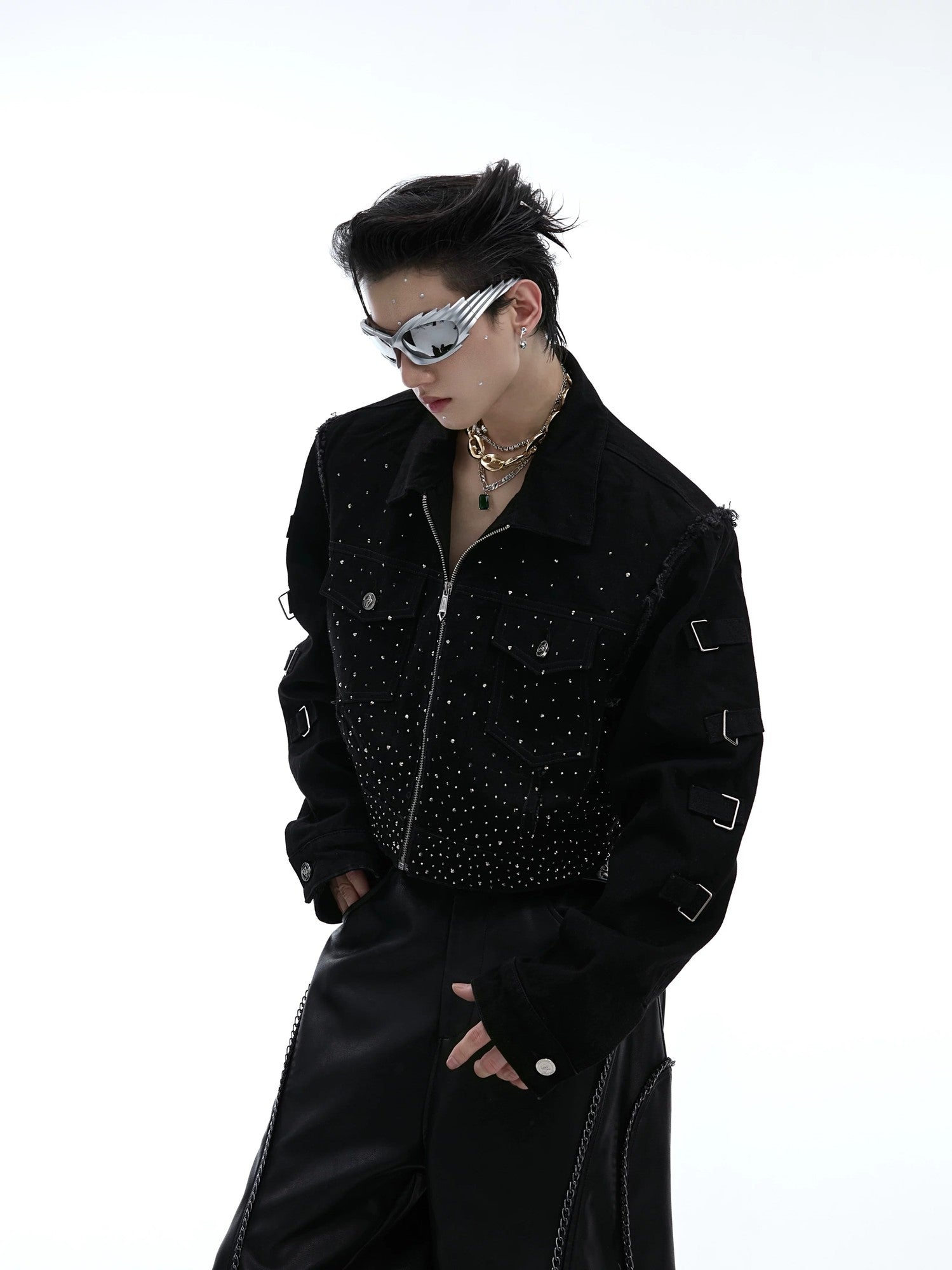 Front view of black cropped jacket with rhinestone gradient design