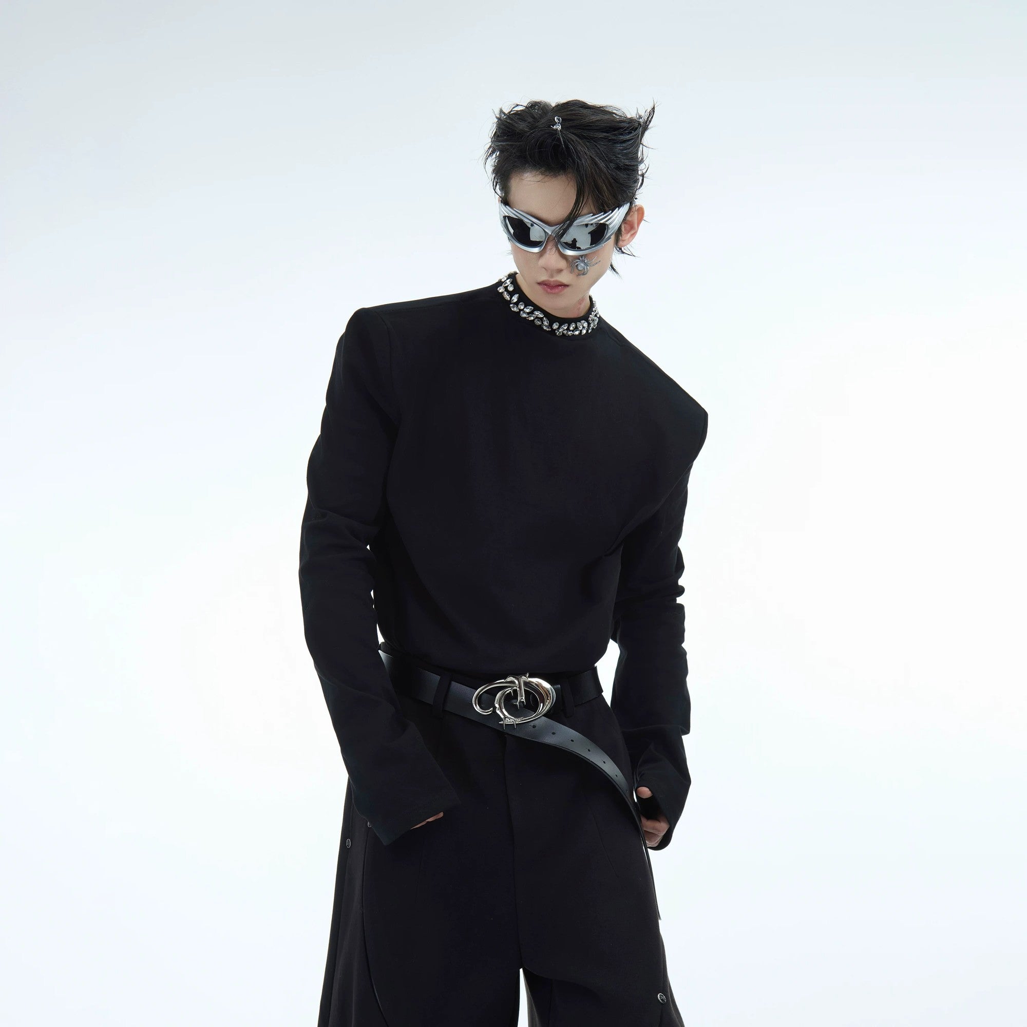 Close-up of sparkling rhinestones on the crewneck base layer