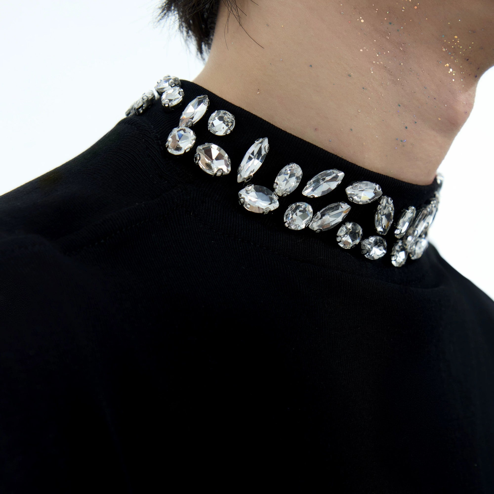 White rhinestone long sleeve top styled with baggy jeans