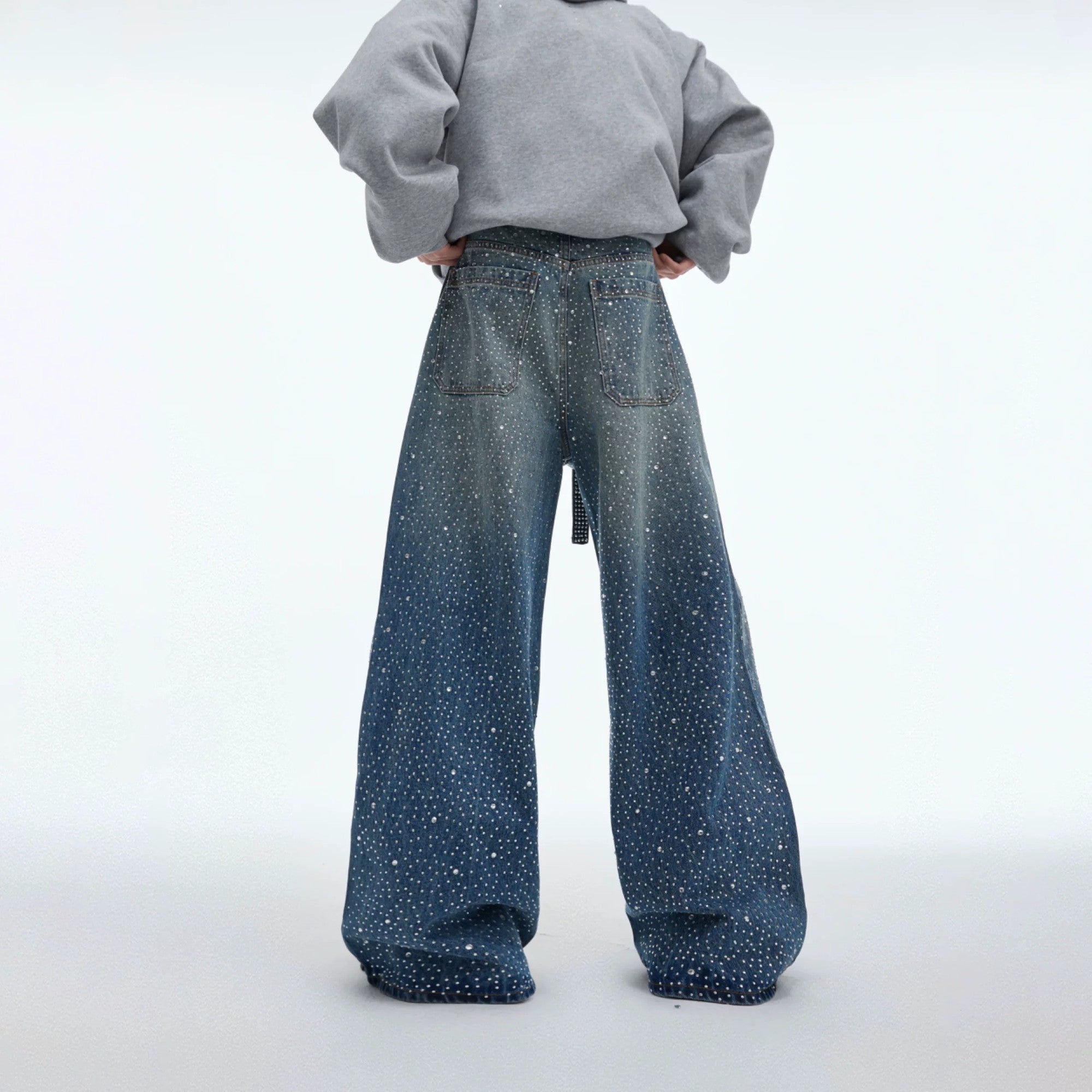 Close-up of premium rhinestone patches and deconstructed stitching