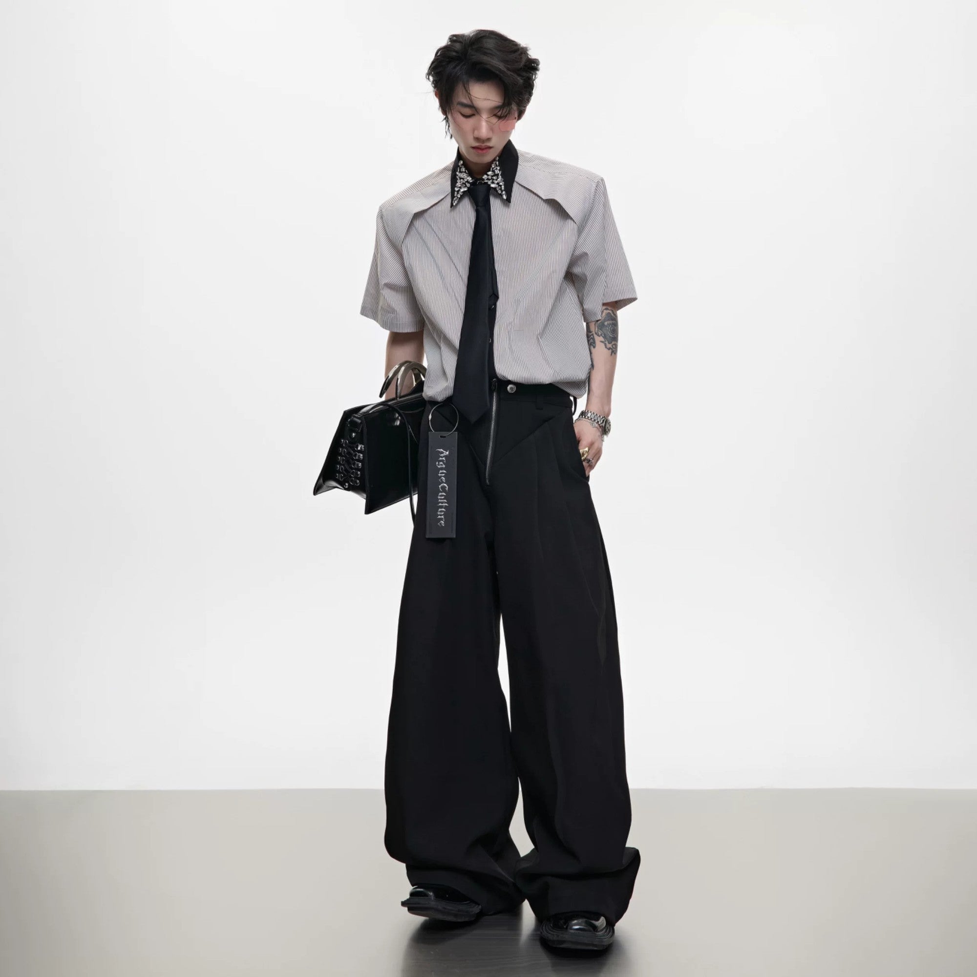 Blue and khaki striped patchwork shirt showing the detachable tie accessory.