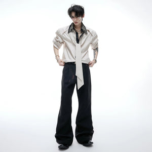 Detail shot of the unique streamer and patchwork design on the sleeve.