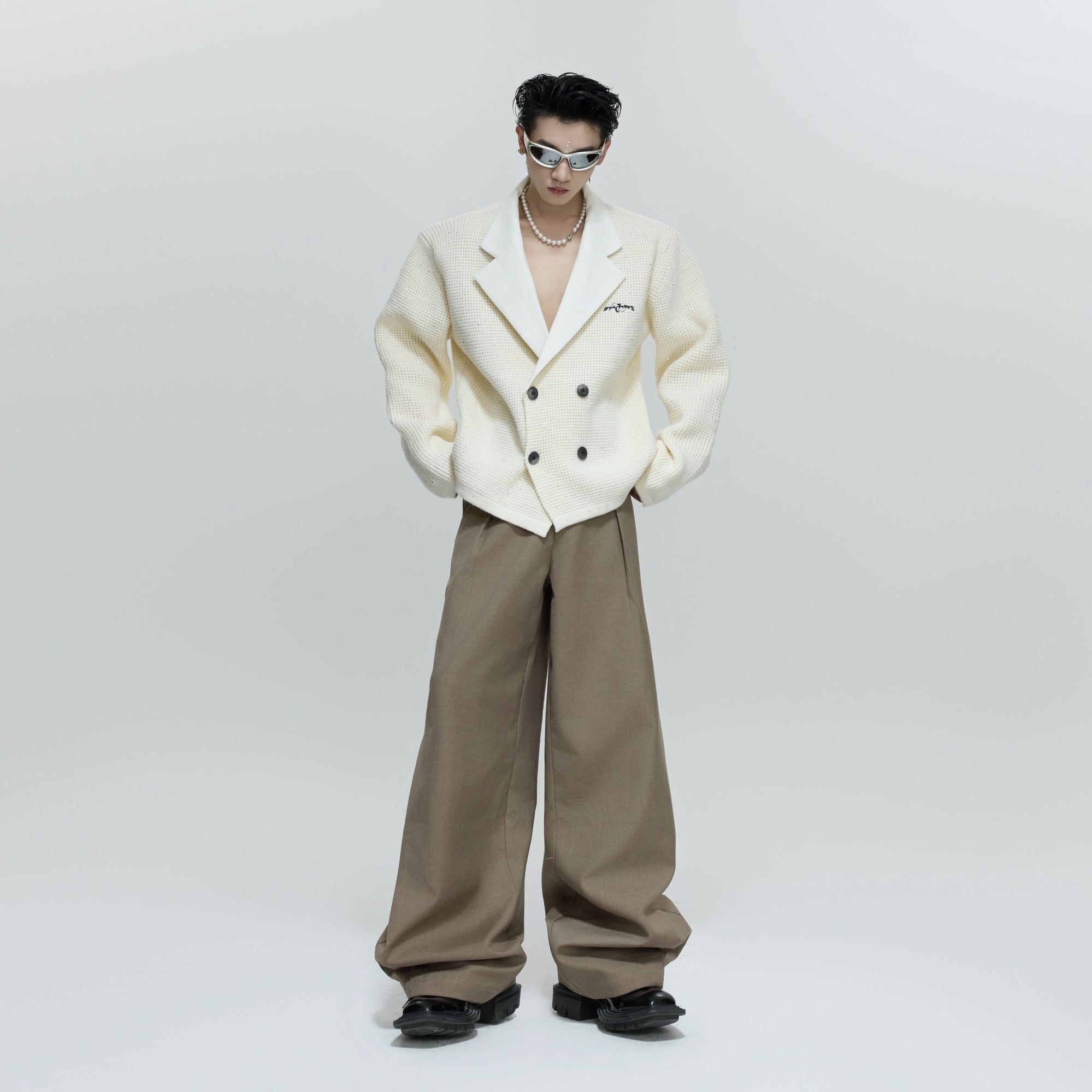 Lifestyle shot of the red sequin cardigan for a street fashion look.